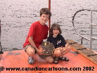 Mark and Chloe with a sunflower